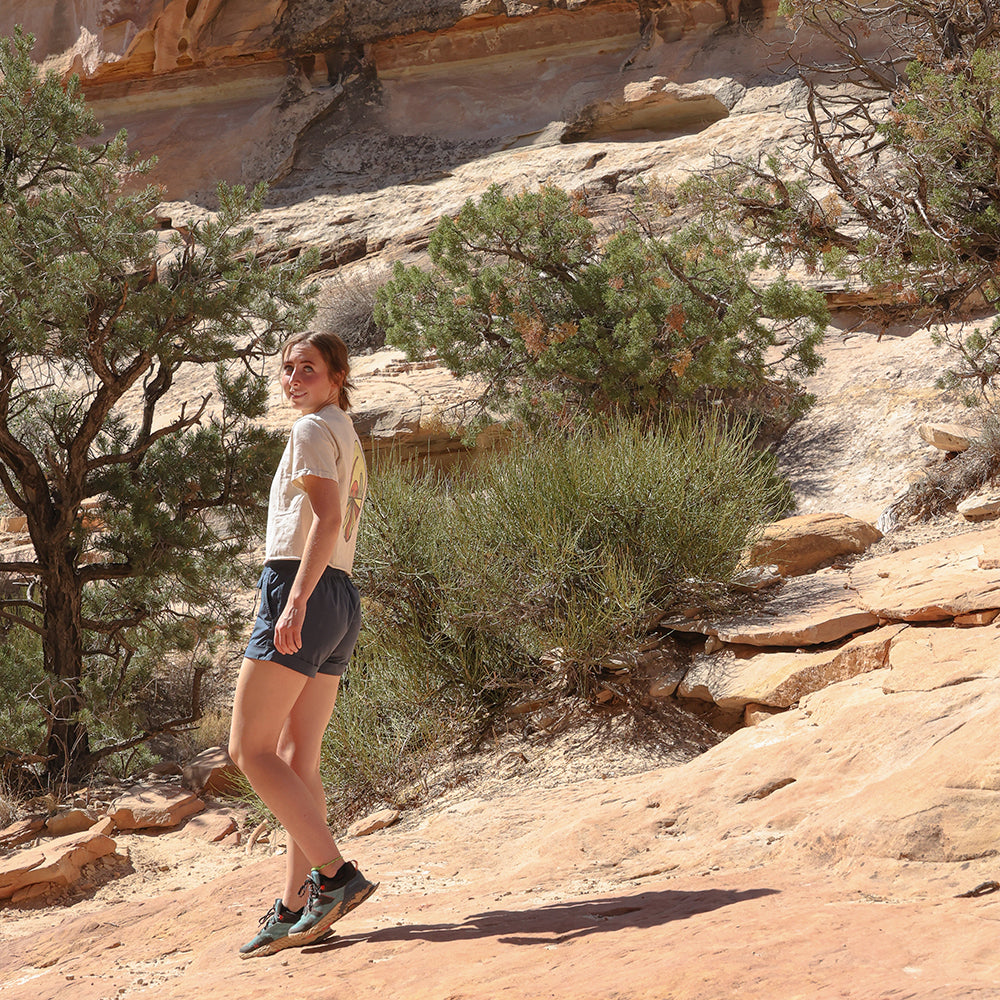 Armadillo Tee on girl walking through the desert