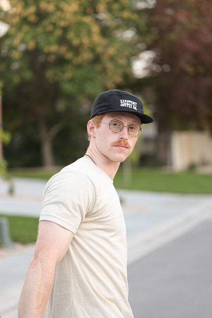 Model with Black Logo Hat